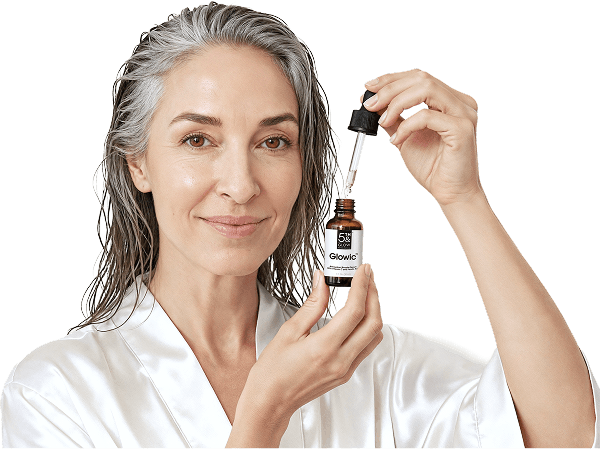 Woman applying Glowic serum in the morning